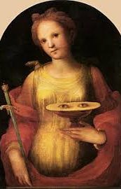 Santa Lucia è spesso rappresentata con gli occhi su un vassoio, poiché la legenda racconta che si levò gli occhi così che colui che era innamorato di lei non potesse ammirarli. (“Santa Lucia”di Domenico di Pace Beccafumi, 1521